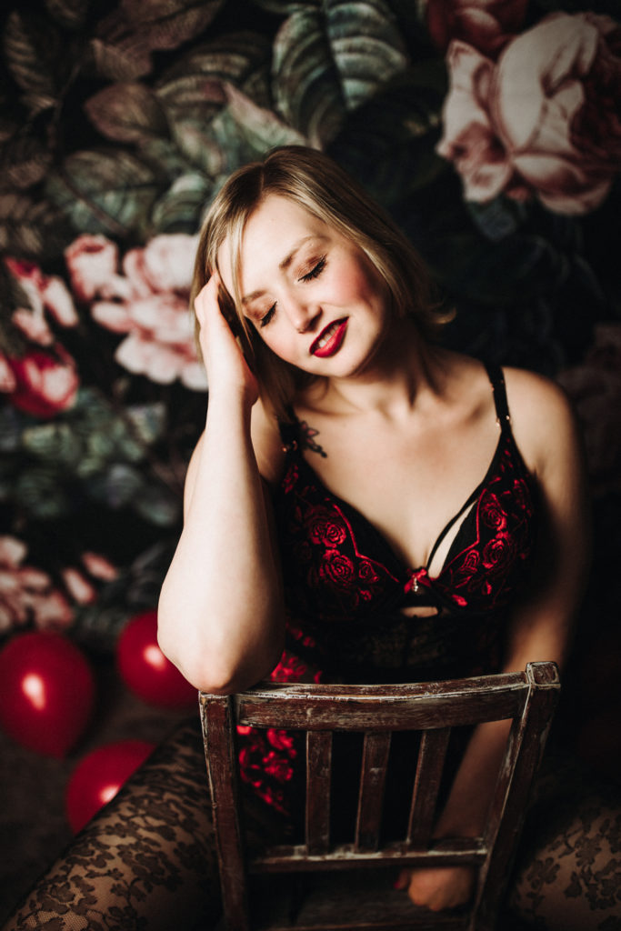 woman with blond hair wearing red lingerie