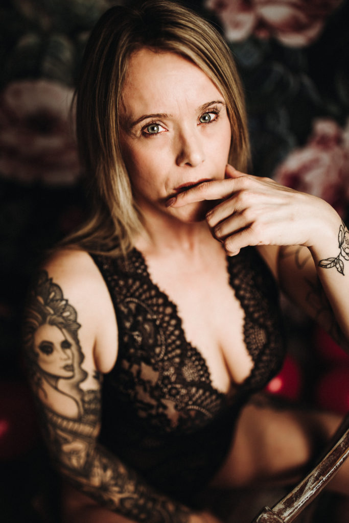 boudoir photo of woman with tattoos - empowerment boudoir session